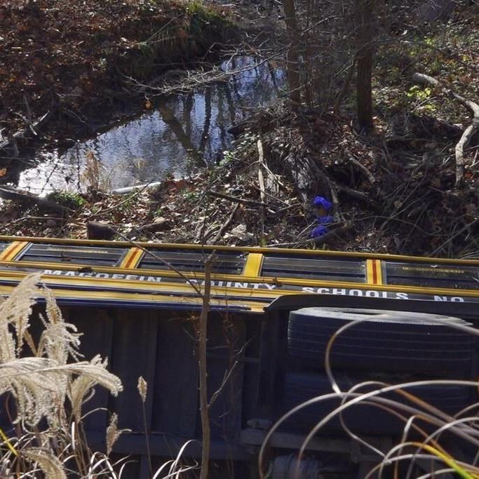 Kentucky school bus crashes off embankment, 18 children hurt